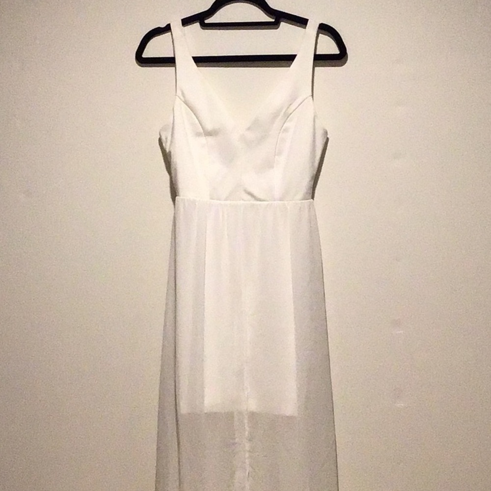 Sleeveless minidress with sheer overlay